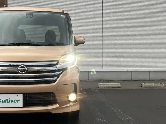 日産 デイズ ルークス ハイウェイスターターボ 秋田県 2016(平28)年 8.3万km ピンクゴールドM ４WD/ターボ/衝突軽減システム/LEDヘッドライト/純正メモリナビ（DVD/CD/BT）/フルセグ/アラウンドビューモニター/日産純正アルミ（夏タイヤ装着）/スマートキー/純正エンジンスターター/アイドリングストップ/プッシュスタート/ステアリングスイッチ/運転席シートヒーター/ETC/純正フロアマット/純正ドアバイザー/オートライト/オートエアコン/パワーステアリング/パワーウィンドウ/電動格納ウィンカーミラー/横滑り防止/盗難防止装置/寒冷地仕様/保証書/取扱説明書/記録簿/スペアキー×１