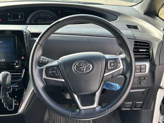 トヨタ エスティマ アエラス プレミアム 鹿児島県 2018(平30)年 10.7万km ホワイトパールクリスタルシャイン フリップダウンモニター/両側パワースライドドア/電動リアゲート/バックカメラ/オットマン/クルーズコントロール/MTモード付AT/パワーシート/フルセグTV/ナビ/ETC/レーンキープアシスト/ハーフレザーシート/純正18インチアルミホイール/プッシュスタート/スマートキー/スペアキー/オートライト/純正フロアマット/衝突被害軽減システム/横滑り防止装置　ワンオーナー