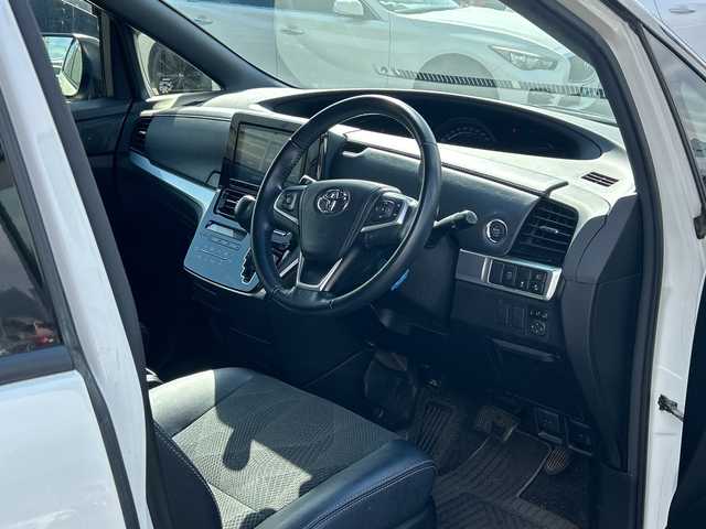 トヨタ エスティマ アエラス プレミアム 鹿児島県 2018(平30)年 10.7万km ホワイトパールクリスタルシャイン フリップダウンモニター/両側パワースライドドア/電動リアゲート/バックカメラ/オットマン/クルーズコントロール/MTモード付AT/パワーシート/フルセグTV/ナビ/ETC/レーンキープアシスト/ハーフレザーシート/純正18インチアルミホイール/プッシュスタート/スマートキー/スペアキー/オートライト/純正フロアマット/衝突被害軽減システム/横滑り防止装置　ワンオーナー