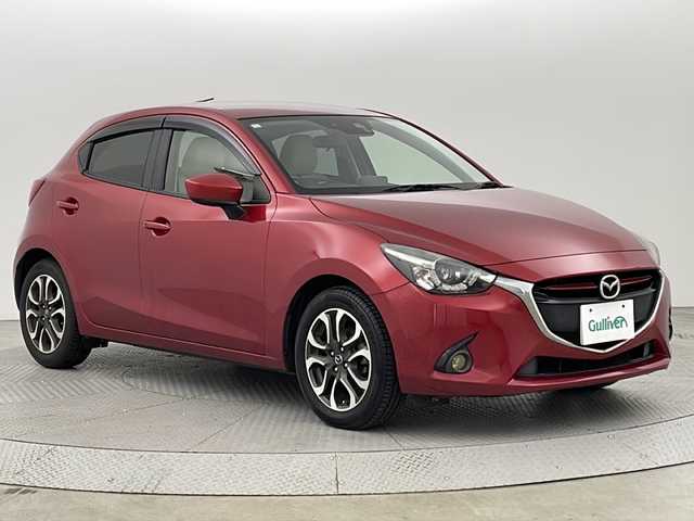 マツダ デミオ XD ツーリング Lパッケージ 新潟県 2014(平26)年 5.6万km ソウルレッドプレミアムメタリック 純正SDナビ/(AM/FM/CD/DVD/SD/フルセグ/Bluetooth)/バックモニター/クルーズコントロール/LEDオートライト/ハーフレザーシート/純正16インチアルミホイール/パドルシフト/ステアリングリモコン/純正フロアマット/ドアバイザー/横滑り防止装置/スマートキー/ETC