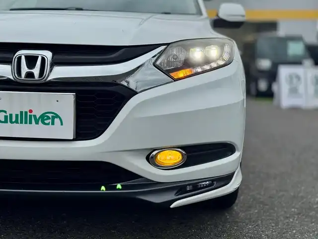 ホンダ ヴェゼル ハイブリッド Z 滋賀県 2014(平26)年 10.7万km ホワイトオーキッドパール 純正フルセグナビ/　フルセグ Bluetooth CD DVD FM AM/バックカメラ/ドライブレコーダー前後/あんしんパッケージ/シティブレーキアクティブシステム/コンフォートビューパッケージ/フルオートエアコンディショナー/LEDヘッドライト/シートヒーターLR/アルミパッケージ/純正17インチアルミスポーツタイプ/純正フロアマット/ドアバイザー/スマートキー×2/プッシュスタート/