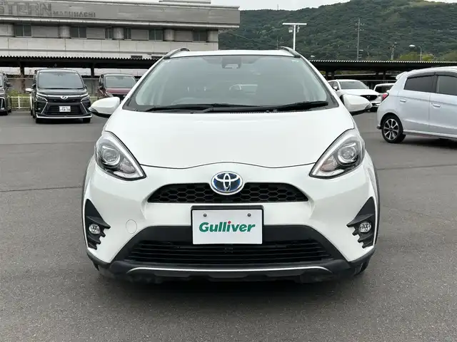 トヨタ アクア クロスオーバー 岡山県 2017(平29)年 2.9万km ライムホワイトパールクリスタルシャイン 社外ナビ　/(AM.FM.TV.CD.DVD.BT.)/ルーフレール　/衝突軽減ブレーキ　/バックカメラ　/レーンキープアシスト　/前後ドライブレコーダー　/オートライト　/オートマチックハイビーム　/ＥＴＣ　/１６インチ純正ＡＷ　/横滑り防止　/プッシュスタート