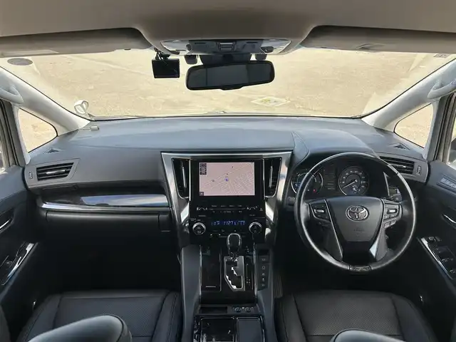 トヨタ アルファードハイブリット SR Cパッケージ 道央・札幌 2021(令3)年 6.4万km ラグジュアリーホワイトパールクリスタルシャインガラスフレーク ４WD/寒冷地仕様/純正メーカーナビ/CD/DVD/USB/BT/純正フリップダウンモニター/トヨタセーフティセンス/プリクラッシュセーフティ/横滑り防止装置/レーダークルーズコントロール/レーンキープアシスト/クリアランスソナー/パーキングサポートブレーキ/ロードサインアシスト/バックカメラ/ビルトインETC2.0/ドライブレコーダー/っ自動防眩ミラー/EVMODE/ECOMODE/ワイパーデアイサー/nanoe/両側パワースライドドア/パワーバックドア/前席/２列目パワーシート/D席メモリーシート/前席シートヒーター/前席エアシート/レザーシート/革巻きウッドコンビステアリング/ステアリングリモコン/ハンドルヒーター/AC100V/電動パーキング/ブレーキホールド/MTモード付AT/プッシュスタート/スマートキー/LEDヘッドライト/オートライト/オートハイビーム/フォグランプ/電動格納ミラー/ウィンカーミラー/純正フロアマット/ドアバイザー/スペアキー