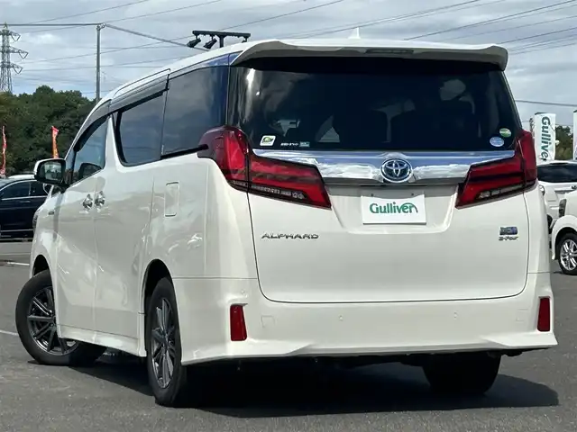 トヨタ アルファードハイブリット SR Cパッケージ 道央・札幌 2021(令3)年 6.4万km ラグジュアリーホワイトパールクリスタルシャインガラスフレーク ４WD/寒冷地仕様/純正メーカーナビ/CD/DVD/USB/BT/純正フリップダウンモニター/トヨタセーフティセンス/プリクラッシュセーフティ/横滑り防止装置/レーダークルーズコントロール/レーンキープアシスト/クリアランスソナー/パーキングサポートブレーキ/ロードサインアシスト/バックカメラ/ビルトインETC2.0/ドライブレコーダー/っ自動防眩ミラー/EVMODE/ECOMODE/ワイパーデアイサー/nanoe/両側パワースライドドア/パワーバックドア/前席/２列目パワーシート/D席メモリーシート/前席シートヒーター/前席エアシート/レザーシート/革巻きウッドコンビステアリング/ステアリングリモコン/ハンドルヒーター/AC100V/電動パーキング/ブレーキホールド/MTモード付AT/プッシュスタート/スマートキー/LEDヘッドライト/オートライト/オートハイビーム/フォグランプ/電動格納ミラー/ウィンカーミラー/純正フロアマット/ドアバイザー/スペアキー