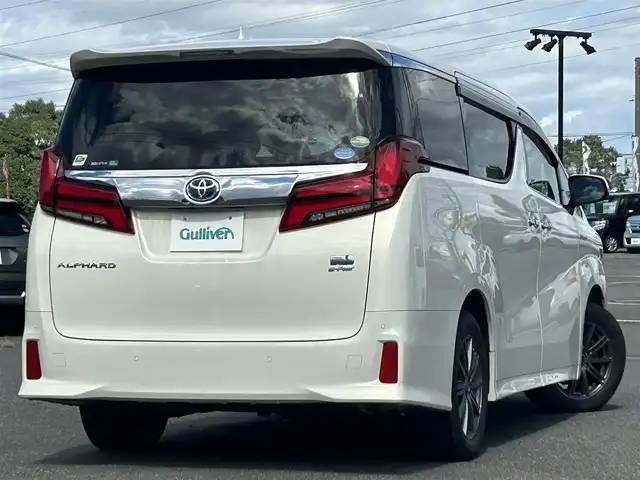 トヨタ アルファードハイブリット SR Cパッケージ 道央・札幌 2021(令3)年 6.4万km ラグジュアリーホワイトパールクリスタルシャインガラスフレーク ４WD/寒冷地仕様/純正メーカーナビ/CD/DVD/USB/BT/純正フリップダウンモニター/トヨタセーフティセンス/プリクラッシュセーフティ/横滑り防止装置/レーダークルーズコントロール/レーンキープアシスト/クリアランスソナー/パーキングサポートブレーキ/ロードサインアシスト/バックカメラ/ビルトインETC2.0/ドライブレコーダー/っ自動防眩ミラー/EVMODE/ECOMODE/ワイパーデアイサー/nanoe/両側パワースライドドア/パワーバックドア/前席/２列目パワーシート/D席メモリーシート/前席シートヒーター/前席エアシート/レザーシート/革巻きウッドコンビステアリング/ステアリングリモコン/ハンドルヒーター/AC100V/電動パーキング/ブレーキホールド/MTモード付AT/プッシュスタート/スマートキー/LEDヘッドライト/オートライト/オートハイビーム/フォグランプ/電動格納ミラー/ウィンカーミラー/純正フロアマット/ドアバイザー/スペアキー