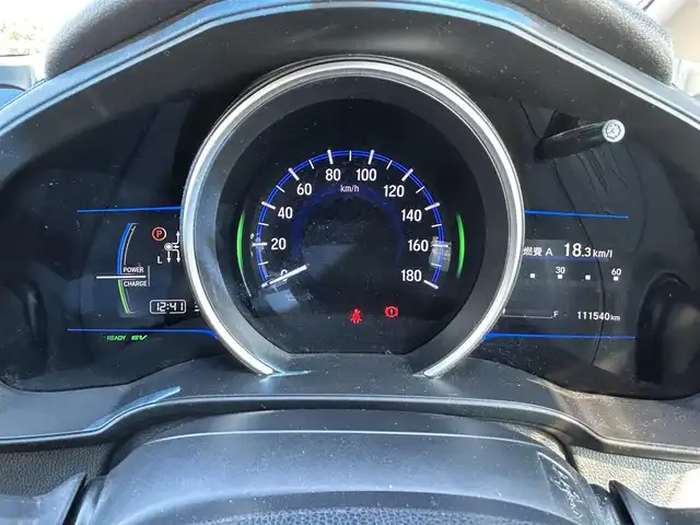 ホンダ フィット ハイブリット Lパッケージ 佐賀県 2014(平26)年 11.2万km ティンテッドシルバーM /KENWOODナビ//バックカメラ//フルセグTV/CD/DVD/USB//ETC//クルーズコントロール//ハーフレザーシート//スマートキー//スペアキー//プッシュスタート//先行車発信お知らせ機能//新車保証書//取扱説明書