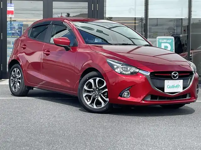 マツダ デミオ XD ツーリング 茨城県 2015(平27)年 8万km ソウルレッドプレミアムメタリック 純正SDナビ/バックカメラ/アイドリングストップ/コーナーセンサー/レーンキープアシスト/ドライブレコーダー/ステアリングスイッチ/横滑り防止装置/盗難防止装置/純正LED/ETC