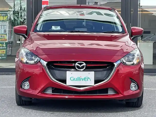 マツダ デミオ XD ツーリング 茨城県 2015(平27)年 8万km ソウルレッドプレミアムメタリック 純正SDナビ/バックカメラ/アイドリングストップ/コーナーセンサー/レーンキープアシスト/ドライブレコーダー/ステアリングスイッチ/横滑り防止装置/盗難防止装置/純正LED/ETC