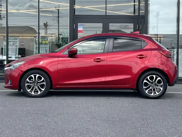 マツダ デミオ XD ツーリング 茨城県 2015(平27)年 8万km ソウルレッドプレミアムメタリック 純正SDナビ/バックカメラ/アイドリングストップ/コーナーセンサー/レーンキープアシスト/ドライブレコーダー/ステアリングスイッチ/横滑り防止装置/盗難防止装置/純正LED/ETC