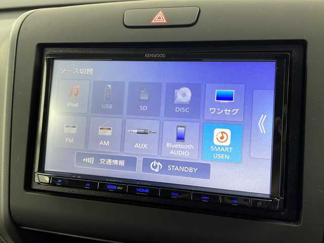 ホンダ フリード クロスター 愛知県 2022(令4)年 0.8万km プラチナホワイトパール KENWOOD製ナビ/【Bluetooth/USB/AM/FM/TV/CD/AUX】/両側パワースライドドア/バックカメラ/ホンダセンシング/・衝突被害軽減ブレーキ/・レーンアシスト/・盗難防止装置/・横滑り防止装置/・コーナーセンサー/・レーダークルーズコントロール/アイドリングストップ/前席シートヒーター/ハーフレザーシート/カーテンエアバック/ETC/純正フロアマット/スペアキー/LEDオートライト/ルーフレール/純正15インチアルミホイール/電動格納ミラー