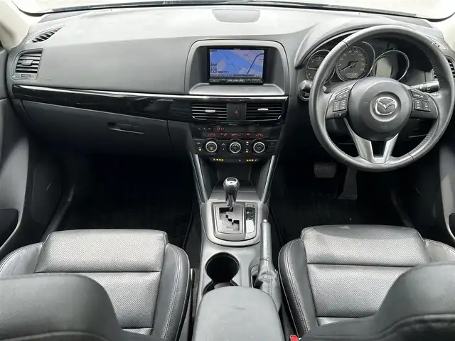マツダ ＣＸ－５ XD Lパッケージ 長崎県 2012(平24)年 7.3万km ブラック (株)IDOMが運営する【じしゃロン長崎店】の自社ローン専用車両になりますこちらは現金またはオートローンご利用時の価格です。自社ローンご希望の方は別途その旨お申付け下さい/ナビ　/バックカメラ　/サイドカメラ　/黒革シート　/シートヒーター　/パワーシート　/ＢＯＳＥサウンド　/クルーズコントロール　/プッシュスタート　/ＨＩＤヘッドライト　/オートライト　/フォグランプ　/ＡＦＳ　/ＥＴＣ