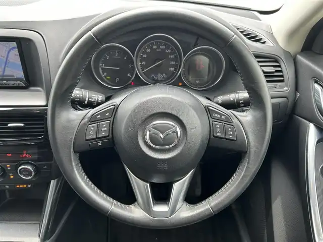 マツダ ＣＸ－５ XD Lパッケージ 長崎県 2012(平24)年 7.3万km ブラック (株)IDOMが運営する【じしゃロン長崎店】の自社ローン専用車両になりますこちらは現金またはオートローンご利用時の価格です。自社ローンご希望の方は別途その旨お申付け下さい/ナビ　/バックカメラ　/サイドカメラ　/黒革シート　/シートヒーター　/パワーシート　/ＢＯＳＥサウンド　/クルーズコントロール　/プッシュスタート　/ＨＩＤヘッドライト　/オートライト　/フォグランプ　/ＡＦＳ　/ＥＴＣ