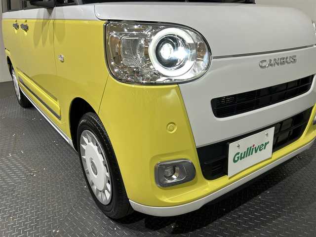 ダイハツ ムーヴ キャンバス ストライプス G 愛媛県 2022(令4)年 1.2万km シャイニングホワイトパール/シトラスイエロークリスタルシャイン 社外ナビ/(Bluetooth/フルセグ)/バックカメラ/ホッとカップホルダー/衝突被害軽減ブレーキ/レーンキープアシスト/コーナーセンサー/前後ドライブレコーダー/シートヒーター/両側電動スライドドア/ステアリングスイッチ/ブレーキホールド/ドアバイザー/スペアキー/取扱説明書