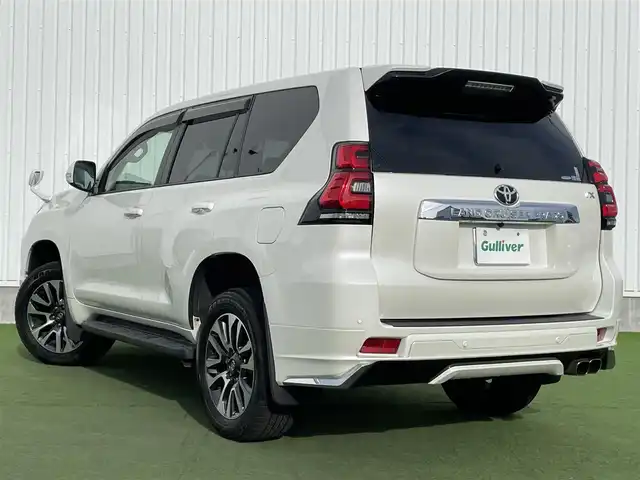 トヨタ ランドクルーザー プラド TX Lパッケージ 香川県 2022(令4)年 2.2万km ホワイトパールクリスタルシャイン トヨタセーフティーセンス/・プリクラッシュ/・LDA/モデリスタエアロ/純正9インチナビ/バックカメラ/ベージュレザーシート/シートヒーター/エアシート/パワーシート/革巻きステアリング/レーダークルーズコントロール/LEDライト/フォグライト/スマートキー/プッシュスタート