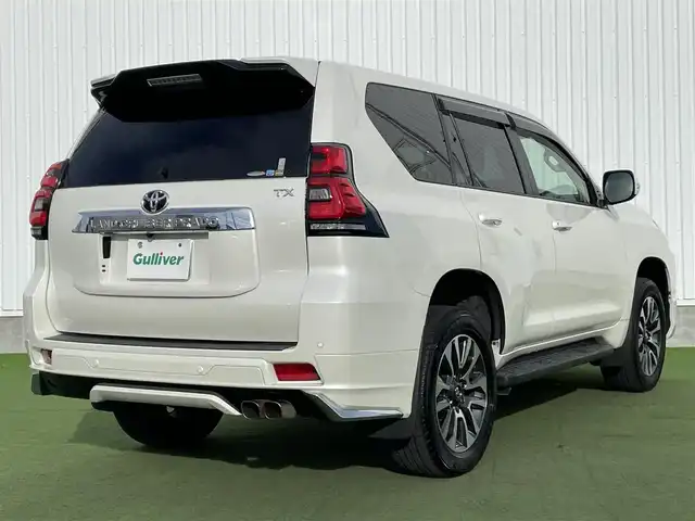 トヨタ ランドクルーザー プラド TX Lパッケージ 香川県 2022(令4)年 2.2万km ホワイトパールクリスタルシャイン トヨタセーフティーセンス/・プリクラッシュ/・LDA/モデリスタエアロ/純正9インチナビ/バックカメラ/ベージュレザーシート/シートヒーター/エアシート/パワーシート/革巻きステアリング/レーダークルーズコントロール/LEDライト/フォグライト/スマートキー/プッシュスタート