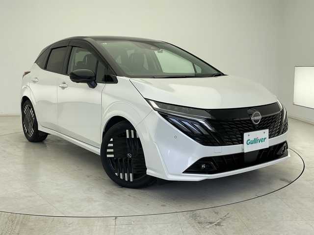 日産 オーラ G レザーエディション 千葉県 2024(令6)年 0.9万km ピュアホワイトパール / スーパーブラック 2トーン プロパイロット/純正メーカーナビ（BT/フルセグ/Carplay/HDMI）/全方位カメラ/ETC2.0/BOSEサウンド/衝突軽減ブレーキ/レーダークルーズコントロール/レーンキープアシスト/前後コーナーセンサー/ドライブレコーダー/ワイヤレス充電/デジタルインナーミラー/ブラインドスポットモニター/純正フロアマット/LEDヘッドライト/オートライト/スマートキー/プッシュスタート
