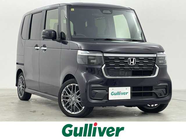 ホンダ Ｎ ＢＯＸ カスタム ターボ 群馬県 2023(令5)年 0.1万km トワイライトミストブラックパール マルチビューカメラシステム/―――――――――――――――/9インチHondaCONNECTナビ/CD/DVD/BT/USB/AppleCarPlay/AndroidAuto/フルセグTV/ホンダセンシング/・衝突軽減ブレーキ(CMBS)/・先行車発進お知らせ/・路外逸脱抑制機能/・標識認識機能/・追従機能付アダプティブクルーズコントロール/・車線維持支援システム(LKAS)/・オートハイビーム/・誤発進抑制機能/・後方誤発進抑制機能/・近距離衝突軽減ブレーキ/・パーキングセンサーシステム/両側パワースライドドア/ハーフレザーシート/前席シートヒーター/LEDヘッドライト/フォグランプ/プッシュスタート/スマートキー/純正フロアマット