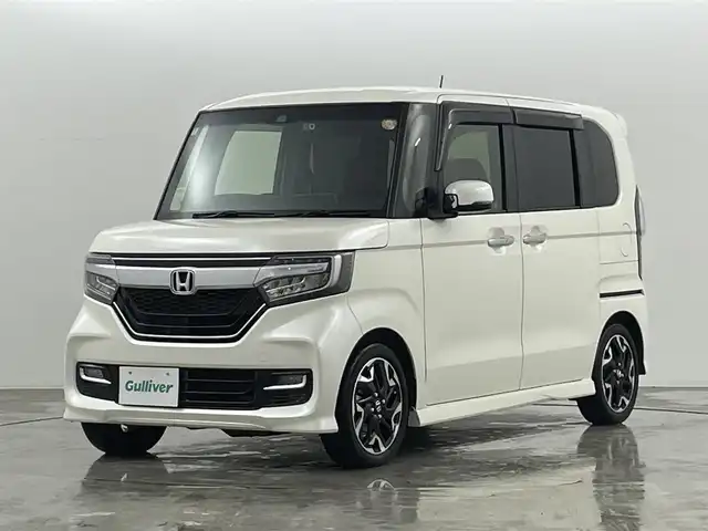 ホンダ Ｎ ＢＯＸ カスタム G EX ターボ ホンダセンシング 福島県 2018(平30)年 5.7万km プレミアムホワイトパールⅡ ホンダセンシング/・CMBS/・車線逸脱警報/・オートハイビーム/・コーナーセンサー　/純正ＳＤナビゲーション/【AM/FM/DVD/CD/Bluetooth/ワンセグ】/型番:VXM-184VFI/ターボ　/ＥＴＣ　/バックカメラ　/両側パワースライドドア　/ステアリングスイッチ　/チルトステアリング　/ドライブレコーダー前後　/プッシュスタート　/・スマートキー　/ＬＥＤライト/・オートライト/オービスレーダー/ウィンカーミラー/純正フロアマット