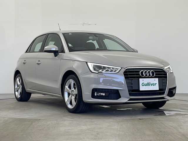 アウディ Ａ１ SB 1．0TFSI スポーツ 秋田県 2018(平30)年 1.5万km シャムベージュメタリック 純正ナビ/ビルトインETC/ドライブレコーダー/アイドリングストップ/前後コーナーセンサー/横滑り防止装置/黒革シート/前席シートヒーター/ドアミラーヒーター/本革ステアリング/ステアリングリモコン/HIDヘッドランプ/フォグランプ/純正アルミホイール/純正フロアマット/W/サイド/カーテン/エアバッグ