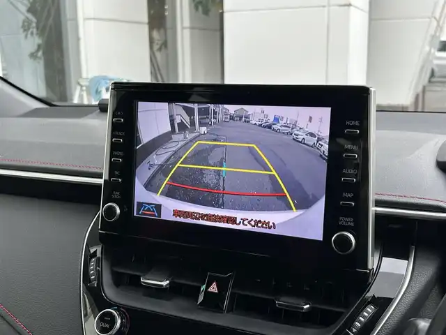 トヨタ カローラ スポーツ ハイブリッドG Z 静岡県 2021(令3)年 5.4万km プラチナホワイトパールマイカ トヨタセーフティーセンス/・プリクラッシュセーフティシステム/・レーントレーシングアシスト/・レーダークルーズコントロール/・オートマッチクハイビーム/・ロードサイドアシスト/純正９インチディスプレイオーディオ/インテリジェントクリアランスソナー/ドライブモードセレクト/・ECO.NORMAL・SPORT/丸形１灯式LEDヘッドランプ/LEDデイライト/LEDフロントフォグランプ/ルーフ同色ドアミラー/（電動オート格納/ヒーター/ウィンカーミラー）/225/40/R18インチ5本ツインスポーク/スポーツ/スェード＆レザー（レッド）/ビルトインETC/ステアリングスイッチ/シートヒーター(D席/N席）/前後社外ドライブレコーダー/ヘッドライトレベライザー