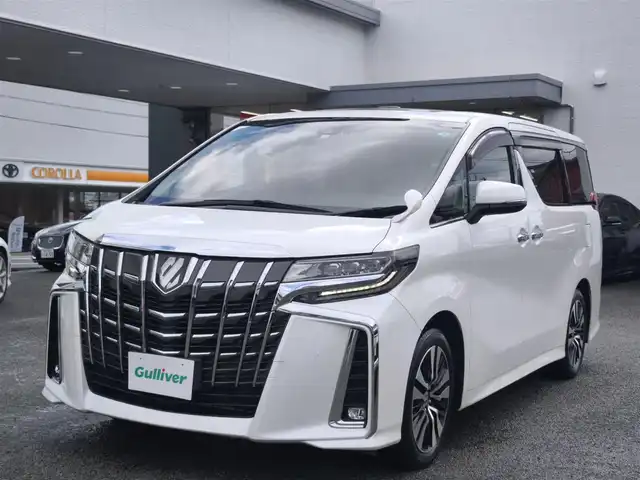 トヨタ アルファード S Cパッケージ 熊本県 2022(令4)年 1.8万km ホワイトパールクリスタルシャイン ワンオーナー/サンルーフ/純正ナビ/【フルセグTV/Bluetooth/CD/DVD】/バックカメラ/デジタルインナーミラー/フリップダウンモニター/両側パワースライドドア/レーダークルーズコントロール/プリクラッシュセーフティー/レーンキープアシスト/パーキングサポートブレーキ/リアクロストラフィックアラート/ブラインドスポットモニター/ロードサインアシスト/ブレーキホールド/ブラックレザーシート/1・2列目パワーシート/前席シートヒーター/エアシート/オートLEDライト/オートハイビーム/ウィンカーミラー/純正18インチAW/100Vアダプタ/革巻きステアリング/ステアリングスイッチ/ステアリングヒーター/プッシュスタート/スマートキー/ETC/社外フロアマット/純正ドアバイザー/保証書/取扱説明書/スペアキー