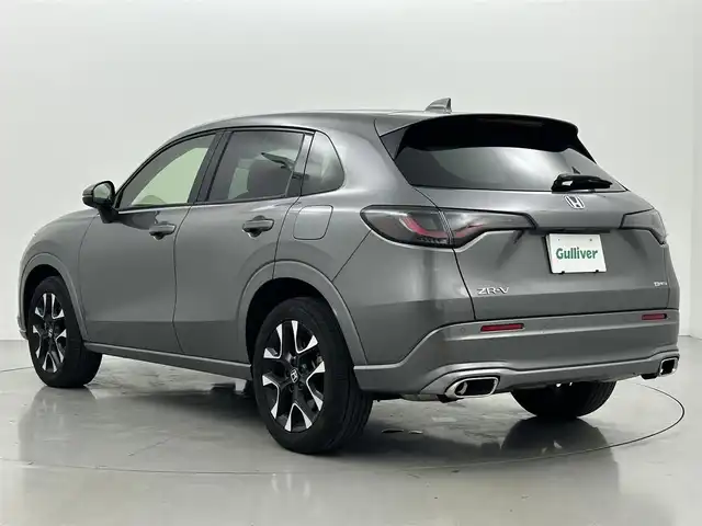 ホンダ ＺＲ－Ｖ ハイブリッド e:HEV Z 熊本県 2023(令5)年 1.6万km スーパープラチナグレーメタリック 禁煙車　/ＢＯＳＥサウンド　/純正ナビ（ＡｐｐｌＣａｒＰｌａｙ・ＡｎｄｒｏｉｄＡｕｔｏ・フルセグ）/全周囲カメラ　/ビルトインＥＴＣ２．０　/衝突軽減ブレーキ/ブラインドスポットモニター/アダブティブクルーズコントロール/先行車発進お知らせ機能/レーンキープアシスト/路外逸脱制御機能/標識認識機能　/横滑り防止/ダウンヒルアシスト/パワーバックドア　/前席シートヒーター/ステアリングヒーター/前席パワーシート/置くだけ充電/パドルシフト/オートライト/LEDヘッドライト/フォグライト/スマートキー/プッシュスタート/スペアキー1本/保証書/取扱説明書