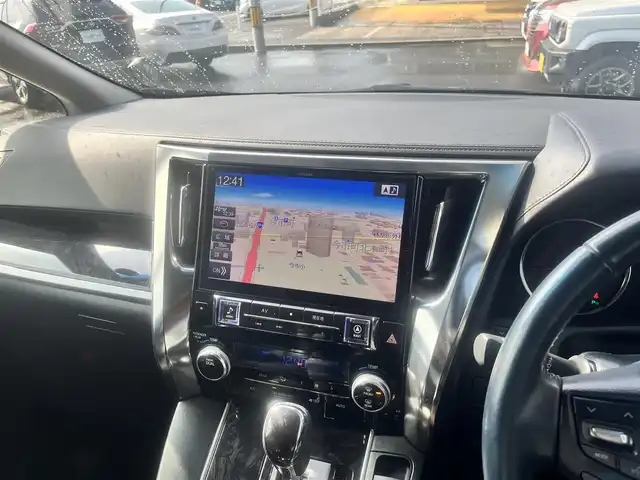 トヨタ アルファード S Aパッケージ 島根県 2019(平31)年 4万km ブラック アルパイン製１１型メモリナビ(アルファード専用)/アルパイン製フリップダウンモニター/TRDフロントスポイラー/フルセグTV ・ DVD再生/バックカメラ ・ Bluetooth/ETC ・ ドラレコ/両側パワースライドドア/助手席+2列目オットマン/クルーズコントロール/オートライト/ハイビーム/電子パーキングブレーキ(ホールド機能付)/衝突軽減ブレーキ・レーンアシスト　/前後コーナーセンサー　/純正LEDヘッドライト/純正フォグランプ/1・2列目レザー調シートカバー/純正18インチアルミホイール　/純正フロアマット/スペアキー1本/保証書・取扱説明書