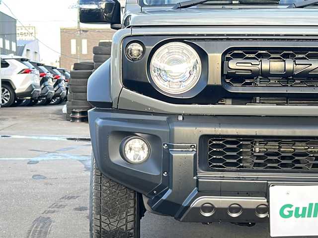 スズキ ジムニー シエラ JC 道北・旭川 2024(令6)年 0.6万km ミディアムグレー /４WD//禁煙車//ワンオーナー//衝突軽減システム//レーンキープアシスト//クルーズコントロール//社外ディスプレイオーディオ/BT/ラジオ/アンドロイドオート/アップルカープレイ//バックカメラ//社外ミラー型ドライブレコーダー//社外スロットルコントローラー//アイドリングストップ//オートエアコン//ミラーヒーター//前席シートヒーター//革巻きステアリング//ステアリングスイッチ//オートライト//LEDヘッドライト//フォグランプ//ミラーウィンカー//ヘッドライトウォッシャー//電動格納ミラー//ドアバイザー//社外テールランプ//社外AWマッドタイヤ積込み//保証書//取説