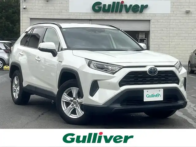トヨタ ＲＡＶ４ ハイブリットX 島根県 2019(令1)年 4.8万km ホワイトパールクリスタルシャイン ワンオーナー　/純正９インチＳＤナビ　/（フルセグＴＶ・ＤＶＤ再生・Ｂｌｕｅｔｏｏｔｈ接続）/バックカメラ　/前後ドライブレコーダー/ビルトインＥＴＣ　/レーダークルーズコントロール/レーンキープアシスト/衝突軽減システム/ブラインドスポットモニター/インテリジェンスクリアランスソナー/オートハイビーム／ライト/デジタルインナーミラー/純正LEDヘッドライト/純正17インチアルミホイール/ハーフレザー調シートカバー/純正フロアマット/取扱説明書／保証書/スペアキー1本