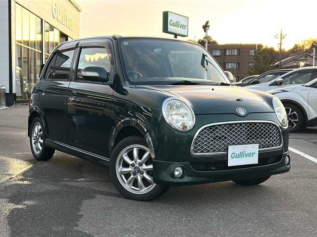 ダイハツ ミラ ジーノ ミニライト 石川県 2004(平16)年 9.4万km ブリティッシュグリーンマイカ ワンオーナー/社外メモリーナビゲーション/【FM/AM・CD/DVD・Bluetooth】/・フルセグTV/前方ドライブレコーダー/KENWOODスピーカー/momoハンドル/オートライト/・フォグランプ/電格ミラー/社外フロアマット