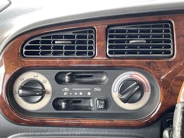 ダイハツ ミラ ジーノ 岐阜県 2000(平12)年 8.7万km ホワイトパールマイカ /純正オーディオ/（AM/FM/CD）//パワーウィンドウ//電動調整ミラー//ドアバイザー//純正フロアマット//エアコン//ベンチシート//エアバック//スタッドレスタイヤホイールセット//木目ハンドル//木目インパネ//紫シート