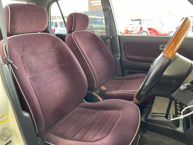 ダイハツ ミラ ジーノ 岐阜県 2000(平12)年 8.7万km ホワイトパールマイカ /純正オーディオ/（AM/FM/CD）//パワーウィンドウ//電動調整ミラー//ドアバイザー//純正フロアマット//エアコン//ベンチシート//エアバック//スタッドレスタイヤホイールセット//木目ハンドル//木目インパネ//紫シート