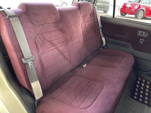 ダイハツ ミラ ジーノ 岐阜県 2000(平12)年 8.7万km ホワイトパールマイカ /純正オーディオ/（AM/FM/CD）//パワーウィンドウ//電動調整ミラー//ドアバイザー//純正フロアマット//エアコン//ベンチシート//エアバック//スタッドレスタイヤホイールセット//木目ハンドル//木目インパネ//紫シート