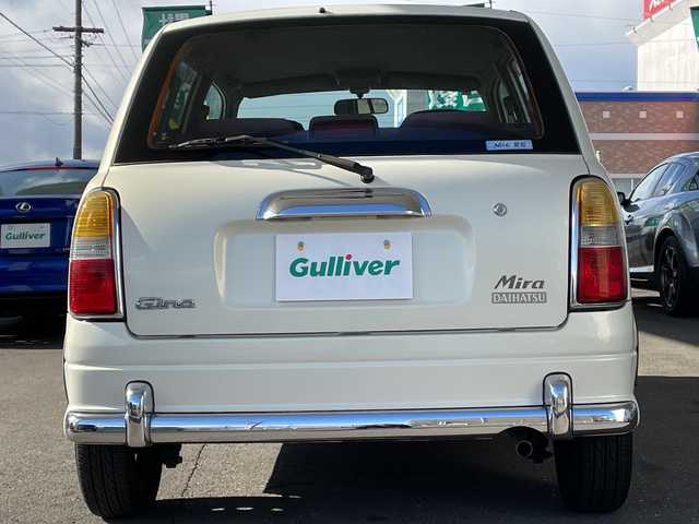 ダイハツ ミラ ジーノ 岐阜県 2000(平12)年 8.7万km ホワイトパールマイカ /純正オーディオ/（AM/FM/CD）//パワーウィンドウ//電動調整ミラー//ドアバイザー//純正フロアマット//エアコン//ベンチシート//エアバック//スタッドレスタイヤホイールセット//木目ハンドル//木目インパネ//紫シート