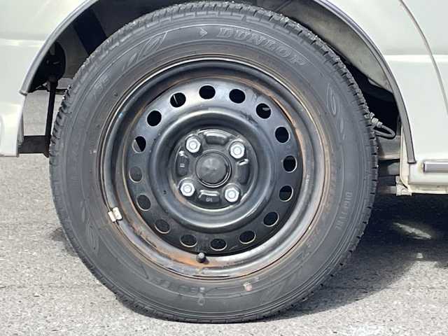 ダイハツ ミラ ジーノ 岐阜県 2000(平12)年 8.7万km ホワイトパールマイカ /純正オーディオ/（AM/FM/CD）//パワーウィンドウ//電動調整ミラー//ドアバイザー//純正フロアマット//エアコン//ベンチシート//エアバック//スタッドレスタイヤホイールセット//木目ハンドル//木目インパネ//紫シート