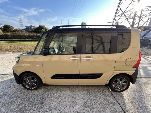 ダイハツ タント ファンクロスターボ 長崎県 2023(令5)年 4.4万km ブラックマイカメタリック/サンドベージュメタリック ワンオーナー/10インチディスプレイオーディオ/（Bluetooth/フルセグ）/バックカメラ/衝突軽減システム/レーンアシスト/両側パワースライドドア/ルーフレール/前後ソナー/前後ドライブレコーダー/シートカバー/シートヒーター/ETC/ステアリングスイッチ/純正15インチAW/AppleCarplay・AndroidAuto/USB