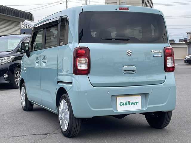 スズキ ワゴンＲ スマイル HYBRID S 道北・旭川 2022(令4)年 2.7万km オフブルーM ・４WD/・禁煙車/・純正ディーラーナビTV/CD/DVD/BT/USB/・前席シートヒーター/・ミラーヒーター/・バックカメラ/・スズキSafetysupprt/・デュアルセンサーブレーキサポートII/・誤発進抑制機能/・低速時ブレーキサポート/・発進お知らせ機能/・標識認識機能/・車線逸脱警報機能/・両側電動スライドドア/・後方コーナーセンサー/・純正フロアトレーマット/・ビルトインETC/・オートライト/・ドアバイザー/・純正スチールホイール/・プッシュスタート/・スマートキー