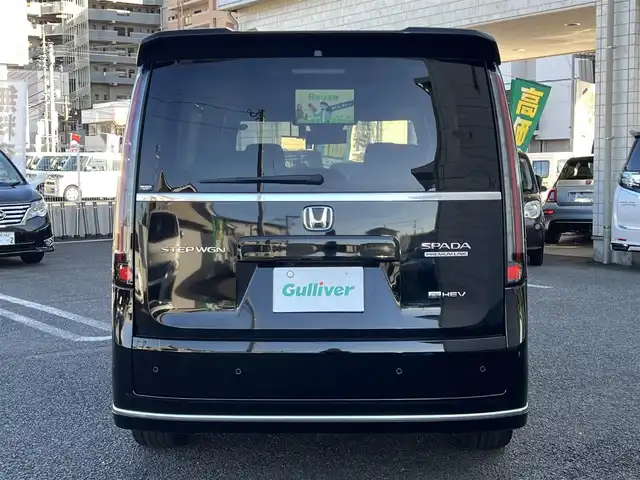 ホンダ ステップワゴン スパーダ eHEV プレミアムライン 大分県 2023(令5)年 4.1万km クリスタルブラックパール ワンオーナー/11.4 インチHonda CONNECTナビ/(LMX-237VFLi)/・フルセグTV/・Bluetooth/・DVD/CD再生/・AM/FMラジオ視聴/外部端子接続：USB/typeC/HDMI/（全列USBチャージャー有り）/純正リア席モニター(VM-231FE)/純正ドラレコ(ナビ連動タイプ：DRH-229ND)/マルチビューカメラシステム/ブラインドスポットインフォメーション/Honda SENSING/●衝突軽減ブレーキ（CMBS）/●誤発進抑制機能/●後方誤発進抑制機能/●近距離衝突軽減ブレーキ/●歩行者事故低減ステアリング/●路外逸脱抑制機能/●渋滞追従機能付アダプティブクルーズコントロール（ACC）/●車線維持支援システム（LKAS）/●トラフィックジャムアシスト（渋滞運転支援機能）/●先行車発進お知らせ機能/●標識認識機能/●オートハイビーム/●アダプティブドライビングビーム/パワーテールゲート/運転席＆助手席シートヒーター/2列目シートヒーター/純正17インチアルミホイール/保証書/取説/スマートキー1本/リア席モニターリモコン