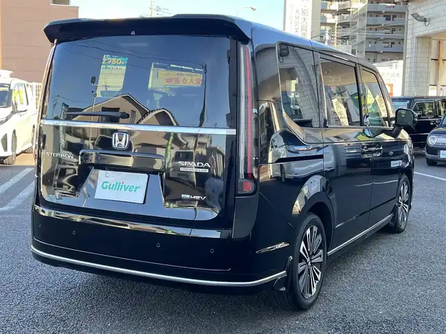 ホンダ ステップワゴン スパーダ eHEV プレミアムライン 大分県 2023(令5)年 4.1万km クリスタルブラックパール ワンオーナー/11.4 インチHonda CONNECTナビ/(LMX-237VFLi)/・フルセグTV/・Bluetooth/・DVD/CD再生/・AM/FMラジオ視聴/外部端子接続：USB/typeC/HDMI/（全列USBチャージャー有り）/純正リア席モニター(VM-231FE)/純正ドラレコ(ナビ連動タイプ：DRH-229ND)/マルチビューカメラシステム/ブラインドスポットインフォメーション/Honda SENSING/●衝突軽減ブレーキ（CMBS）/●誤発進抑制機能/●後方誤発進抑制機能/●近距離衝突軽減ブレーキ/●歩行者事故低減ステアリング/●路外逸脱抑制機能/●渋滞追従機能付アダプティブクルーズコントロール（ACC）/●車線維持支援システム（LKAS）/●トラフィックジャムアシスト（渋滞運転支援機能）/●先行車発進お知らせ機能/●標識認識機能/●オートハイビーム/●アダプティブドライビングビーム/パワーテールゲート/運転席＆助手席シートヒーター/2列目シートヒーター/純正17インチアルミホイール/保証書/取説/スマートキー1本/リア席モニターリモコン