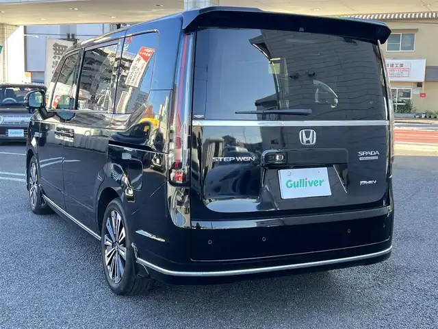 ホンダ ステップワゴン スパーダ eHEV プレミアムライン 大分県 2023(令5)年 4.1万km クリスタルブラックパール ワンオーナー/11.4 インチHonda CONNECTナビ/(LMX-237VFLi)/・フルセグTV/・Bluetooth/・DVD/CD再生/・AM/FMラジオ視聴/外部端子接続：USB/typeC/HDMI/（全列USBチャージャー有り）/純正リア席モニター(VM-231FE)/純正ドラレコ(ナビ連動タイプ：DRH-229ND)/マルチビューカメラシステム/ブラインドスポットインフォメーション/Honda SENSING/●衝突軽減ブレーキ（CMBS）/●誤発進抑制機能/●後方誤発進抑制機能/●近距離衝突軽減ブレーキ/●歩行者事故低減ステアリング/●路外逸脱抑制機能/●渋滞追従機能付アダプティブクルーズコントロール（ACC）/●車線維持支援システム（LKAS）/●トラフィックジャムアシスト（渋滞運転支援機能）/●先行車発進お知らせ機能/●標識認識機能/●オートハイビーム/●アダプティブドライビングビーム/パワーテールゲート/運転席＆助手席シートヒーター/2列目シートヒーター/純正17インチアルミホイール/保証書/取説/スマートキー1本/リア席モニターリモコン