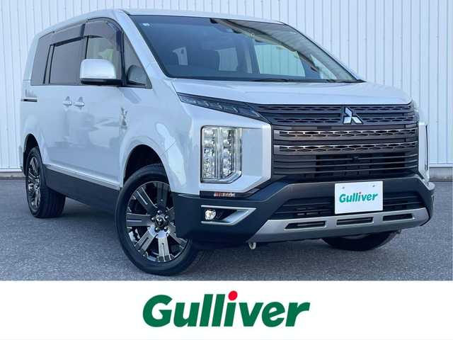 三菱 デリカＤ：５ ジャスパー 滋賀県 2023(令5)年 1.6万km ホワイトダイヤモントド/グラファイトグレーメタリック 純正10.1インチナビ/(Bluetooth/フルセグ/CD/DVD)/E-Assist/・衝突軽減ブレーキ/・レーダークルーズコントロール/・レーンキープアシスト/・マルチアラウンドモニター/・ブラインドスポットモニター/・Autoハイビーム/LEDオートライト/フォグ/両側電動スライドドア/電動リアゲート/電動パーキング/ブレーキホールド/ハーフレザーシート/前席シートヒーター/D席パワーシート/ステアリングヒーター/パドルシフト/ETC/USB