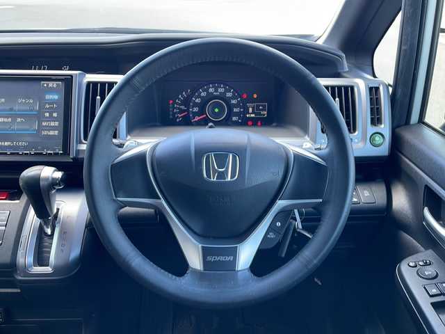 ホンダ ステップワゴン スパーダ Z 三重県 2013(平25)年 14.2万km ホワイトオーキッドパール 純正9インチナビ/バックカメラ/両側パワースライドドア/スペアキー/アイドリングストップ/ECON/横滑り防止装置/革巻きステアリング/パドルシフト/オートライト/フォグランプ/MTモード付AT/純正フロアマット/純正AW/ドアバイザー/電動格納ウィンカーミラー/フルセグTV/CD.DVD再生/禁煙車