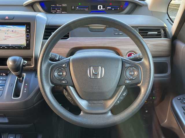 ホンダ フリード G ホンダセンシング 千葉県 2020(令2)年 5.6万km クリスタルブラックパール ナビVXM-204VFi　バックカメラ　両側パワースライドドア　シートヒーター　DVD　BT　USB　レーダークルーズ　ETC　LEDライト　オートライト　ホンダセンシング　スマートキー