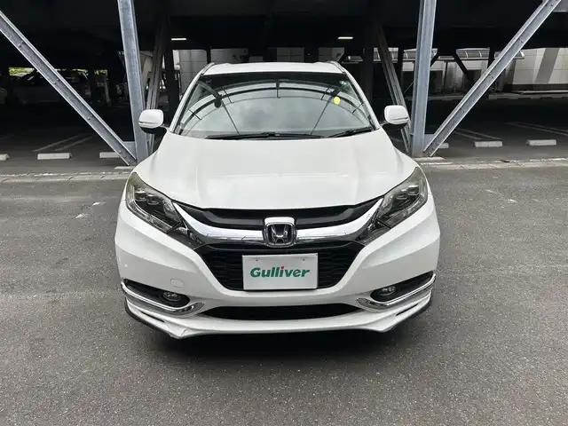 ホンダ ヴェゼル X 静岡県 2014(平26)年 14.2万km ホワイトオーキッドパール 純正ナビ、革巻きハンドル、LEDヘッドライト、純正フロアマット、純正アルミ、Bluetooth、HDDナビ