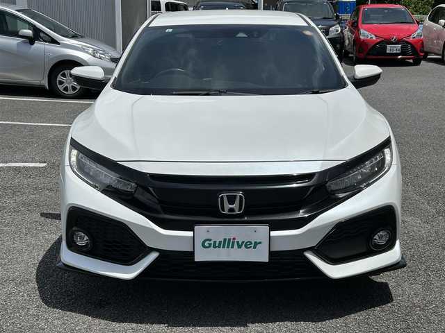 ホンダ シビック ハッチバック 静岡県 2019(平31)年 4.6万km ホワイトオーキッドパール ユーザー買取車両/純正SDナビ（VXM-194VFi）/【FM/AM/BT/CD/DVD/地デジTV】/純正LEDライト/純正18インチAW/クルーズコントロール/エンジンスタートボタン/バックカメラ/ドライブレコーダー（前後）/ETC/純正フロアマット/横滑り防止装置/レーンアシスト/コーナーセンサー/衝撃被害軽減システム/MTモード付AT/スタットレスタイヤ×4/シートヒーター/アイドリングストップ