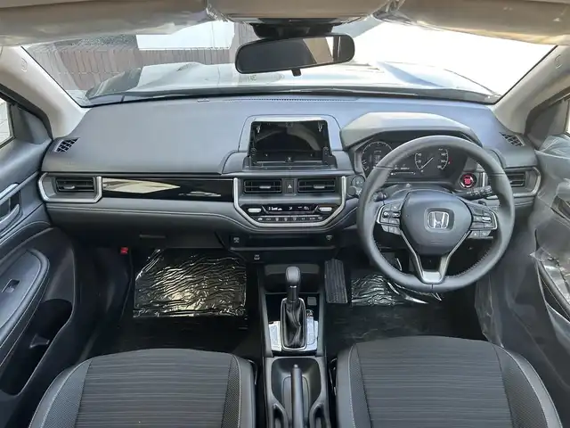 ホンダ ＷＲ－Ｖ Z 静岡県 2025(令7)年 0.1千km クリスタルブラックパール 登録時走行距離22km/Honda SENSING/Honda CONNECT for Gathers＋ナビ装着用スペシャルパッケージ/LEDフォグライト/本革巻ステアリングホイール＋セレクトレバー/アームレスト付センターコンソールボックス/リアセンターアームレスト(ドリンクホルダー付)/パーセルカバー/コンビシート(プライムスムースＸファブリック)/17インチアルミホイール(ベルリナブラック＋切削)/フルLEDヘッドライト〈デイタイムランニングランプ付〉（マニュアルレベリング/オートライトコントロール機構付）/パドルシフト/サイドカーテンエアバッグ