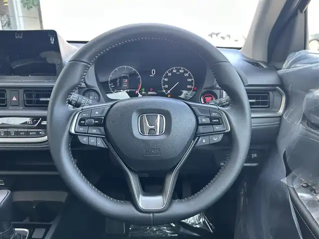 ホンダ ＷＲ－Ｖ Z 静岡県 2025(令7)年 0.1千km クリスタルブラックパール 登録時走行距離22km/Honda SENSING/Honda CONNECT for Gathers＋ナビ装着用スペシャルパッケージ/LEDフォグライト/本革巻ステアリングホイール＋セレクトレバー/アームレスト付センターコンソールボックス/リアセンターアームレスト(ドリンクホルダー付)/パーセルカバー/コンビシート(プライムスムースＸファブリック)/17インチアルミホイール(ベルリナブラック＋切削)/フルLEDヘッドライト〈デイタイムランニングランプ付〉（マニュアルレベリング/オートライトコントロール機構付）/パドルシフト/サイドカーテンエアバッグ