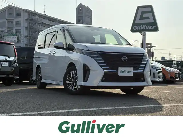 日産 セレナ ハイウェイスター V 大分県 2023(令5)年 1万km プリズムホワイト ・SDナビ(CD/DVD/SD/BT/USB)/・アラウンドビューモニター/・フルセグテレビ/・両側パワースライドドア/・プロパイロット/・エマージェンシーブレーキ/・コーナーセンサー/・ブラインドスポットモニター/・ドライブレコーダー/・オートハイビーム/・ブレーキホールド/・デジタルインナーミラー/・ステアリングリモコン/・パドルシフト/・スマートキー