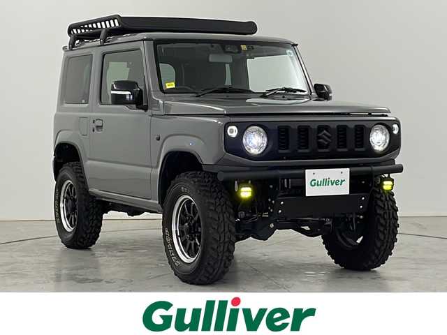 スズキ ジムニー XC 道央・札幌 2022(令4)年 1.4万km グレー ・４WD /ターボ/・スズキセーフティサポート/・デュアルセンサーブレーキサポート/・リフトアップ/社外サス.ショック/・ラテラルロット/RAYSアルミホイール/・マッドタイヤ（GRANDTREK MT2）/・社外テール/社外フロントバンパー/・純正サス/ショック/テール有/・社外9インチナビ/・DVD.CD.SD.Bluetooth/・フルセグ/バックカメラ/・クルーズコントロール/・フロント左右シートヒーター/・LEDライト/オートハイビーム/・社外フォグランプ/社外ルーフキャリア/・ETC/ドライブレコーダー