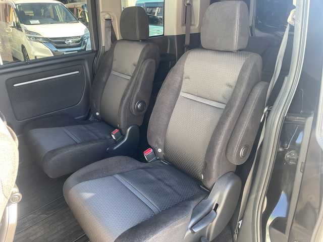 ホンダ ステップワゴン スパーダ ホンダセンシング 神奈川県 2018(平30)年 4万km プレミアムスパークルブラックパール 純正HDDナビ（AV-RQ912）/Bluetooth/フルセグ/iPod/AUX/USB/CD/DVD/両側パワースライドドア/追従式クルーズコントロール/バックカメラ/ドライブレコーダー/デジタルミラー/プッシュスタート/スマートキー/パドルシフト/LEDヘッドライト/フォグランプ/純正アルミホイール/純正フロアマット/電動格納ミラー/ドアバイザー/横滑り防止装置/レーンキープアシスト/衝突被害軽減システム